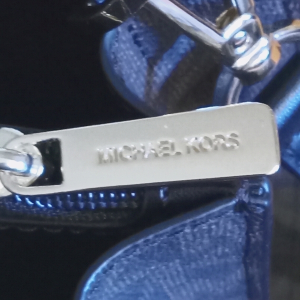 MK bag , not used. Was a present for my birthday.  Carried out twice.